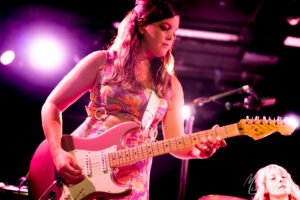 Nicole Damoff on guitar